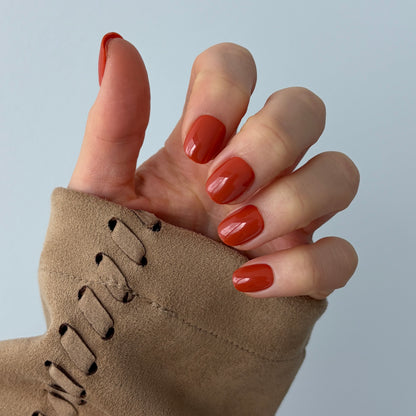 Reusable salon quality extra-short press-on nails in burnt orange colour for Halloween